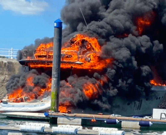 Fire-gutted motor yacht ‘Rendezvous’ salvaged from Torquay harbour
