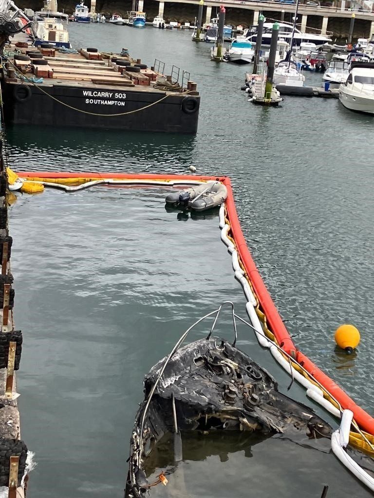 Fire-gutted motor yacht ‘Rendezvous’ salvaged from Torquay harbour