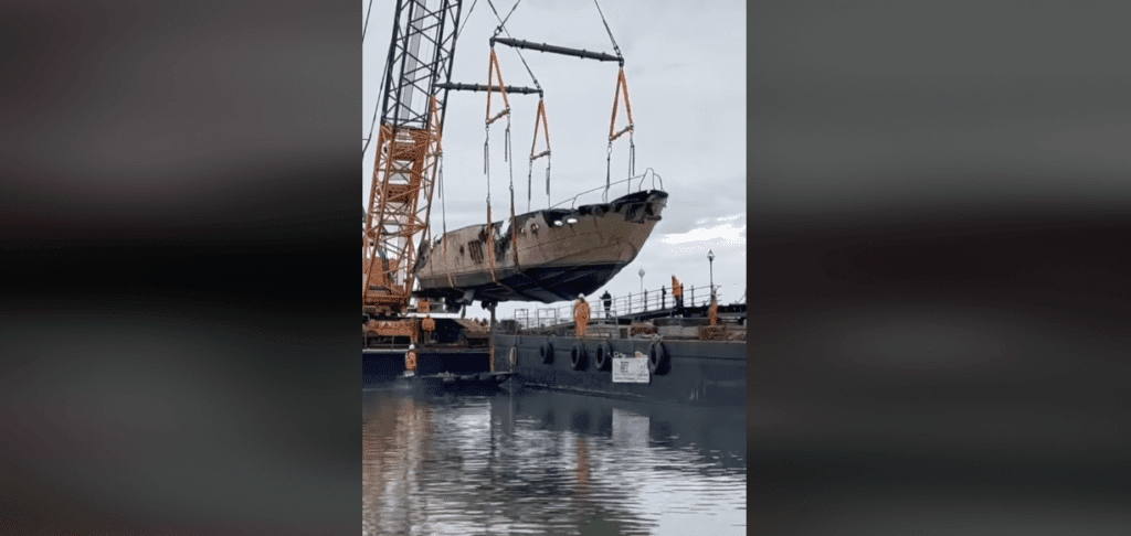 Fire-gutted motor yacht ‘Rendezvous’ salvaged from Torquay harbour