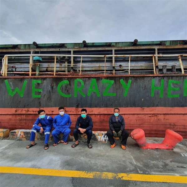 Crew Abandoned in Taiwan Paints Appeals for Help on Ship’s Hull Crew Abandoned in Taiwan Paints Appeals for Help on Ship’s Hull