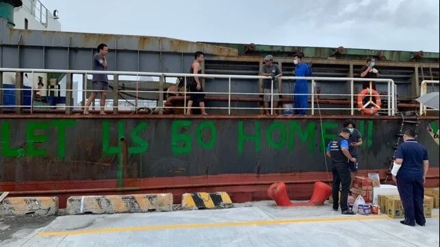 Crew Abandoned in Taiwan Paints Appeals for Help on Ship’s Hull Crew Abandoned in Taiwan Paints Appeals for Help on Ship’s Hull