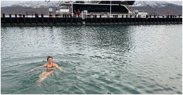 Arctic swimming, brewery stop & husky experience for cruise line representatives in Svalbard