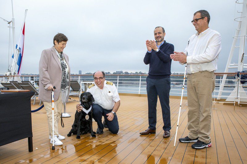 Holland America Presents Elite Status and Platinum Medallion to Service Dog Holland America Presents Elite Status and Platinum Medallion to Service Dog