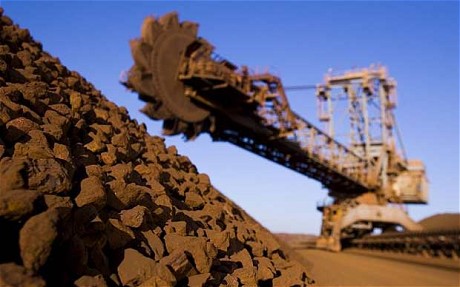 Iron ore slips amid high inventories at China ports